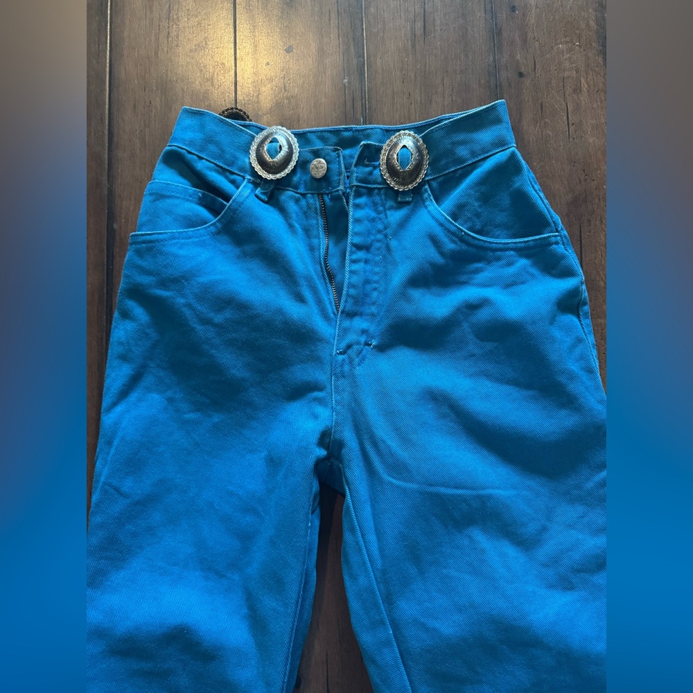 Vintage blue high-rise roper jeans with Concho belt loops